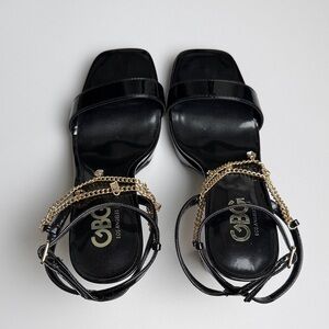 GBG Los Angeles Black Heels with Gold Chains